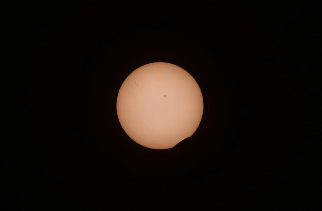 Shortly after first contact during the partial phase of the total solar eclipse of April 8, 2024. Credit: Sævar Helgi Bragason
